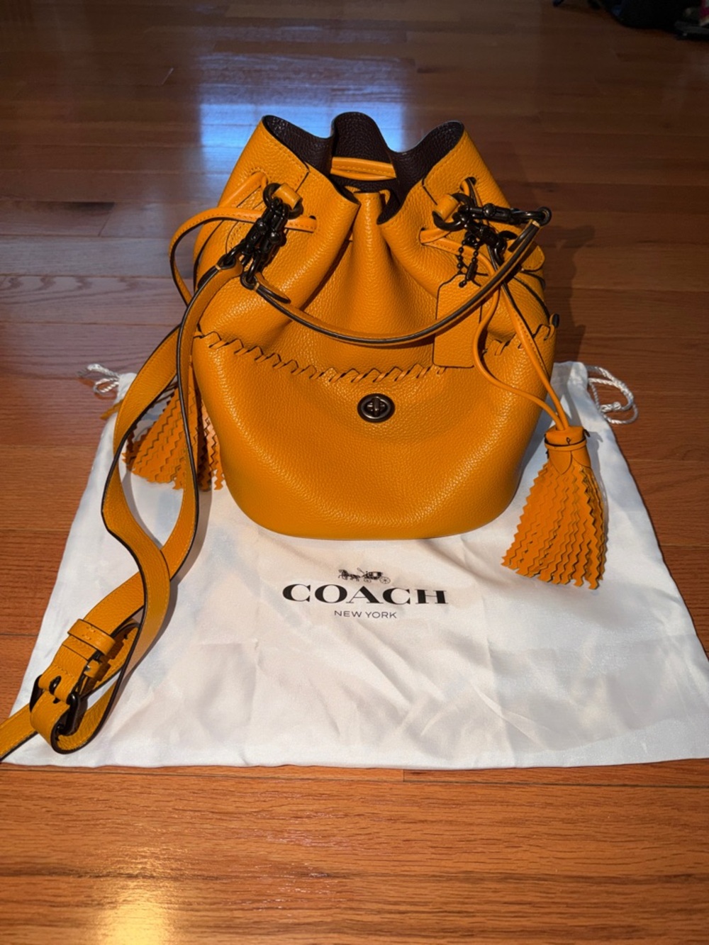 Coach Pebbled Leather Drawstring Bucket Bag in Bright Orange